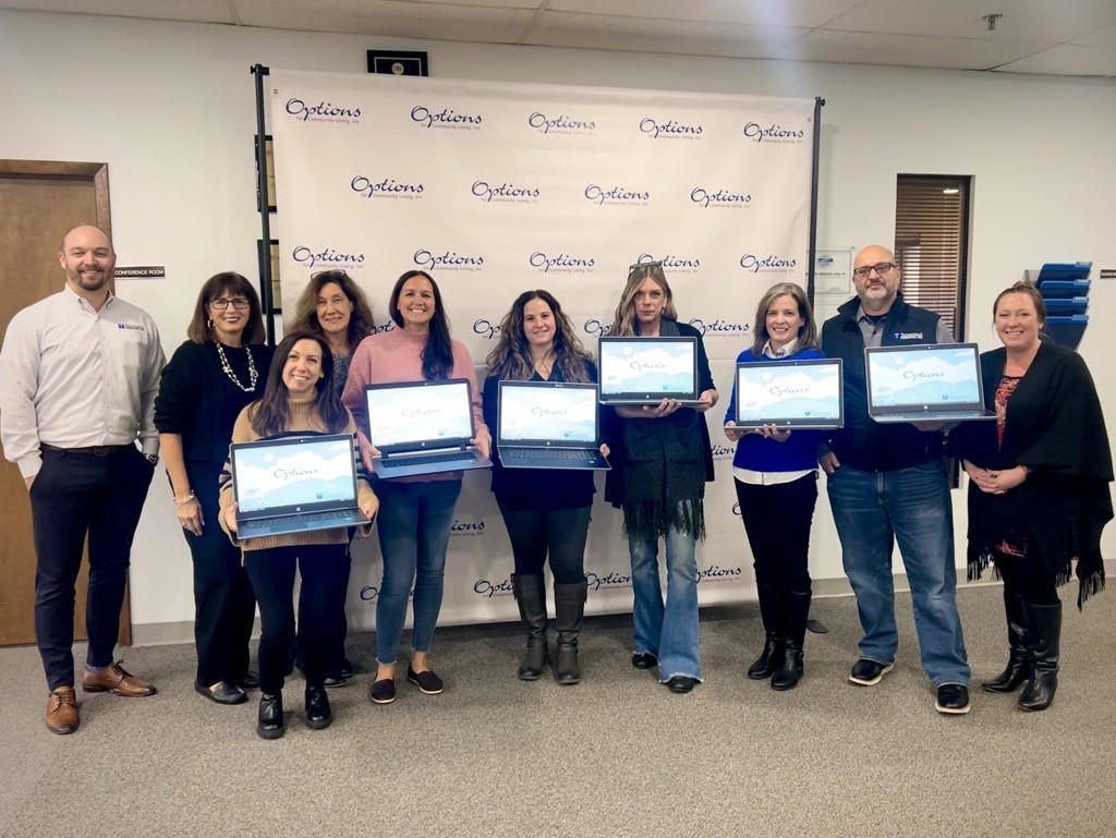 Techworks Gives Back: Refurbished Laptops Donated to Options for Community Living