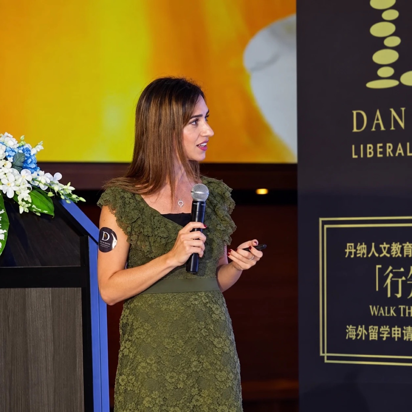 Andrea Schiralli speaking at an educational consulting conference