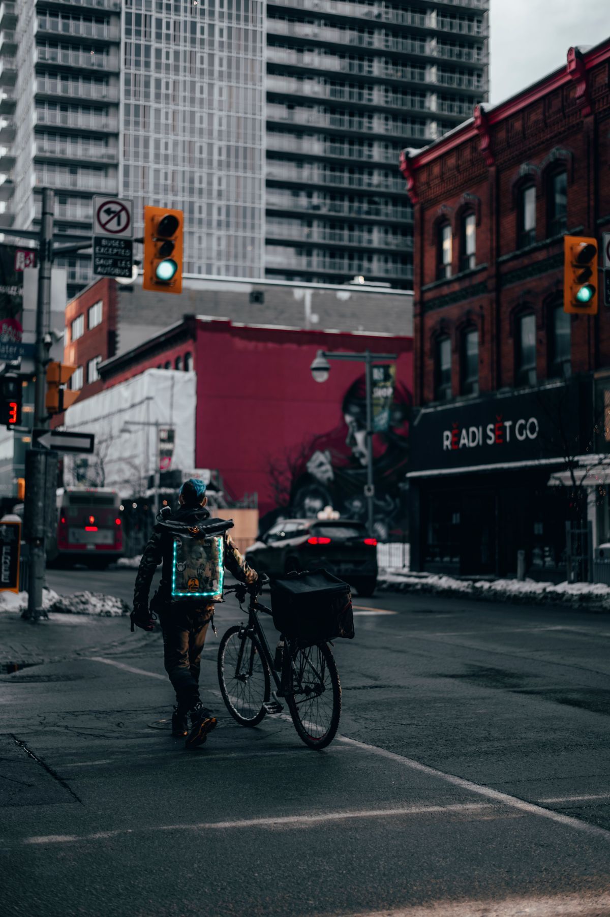 Cyclist travelling through an urban Ottawa intersection
