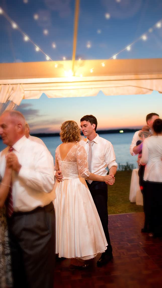 A Bride and Groom dancing along the Wicomico River's sunset