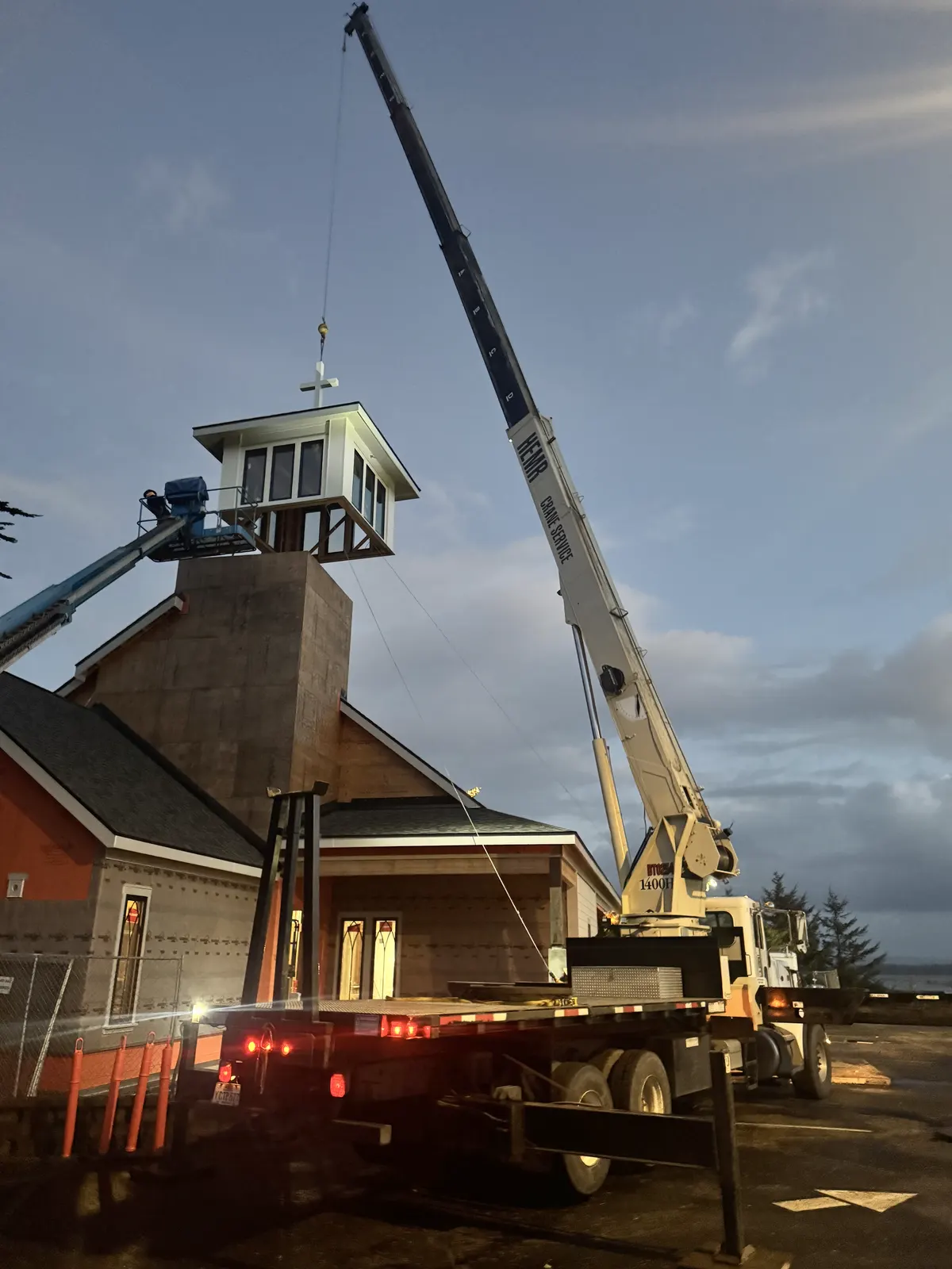 Crane service to place a new church steeple