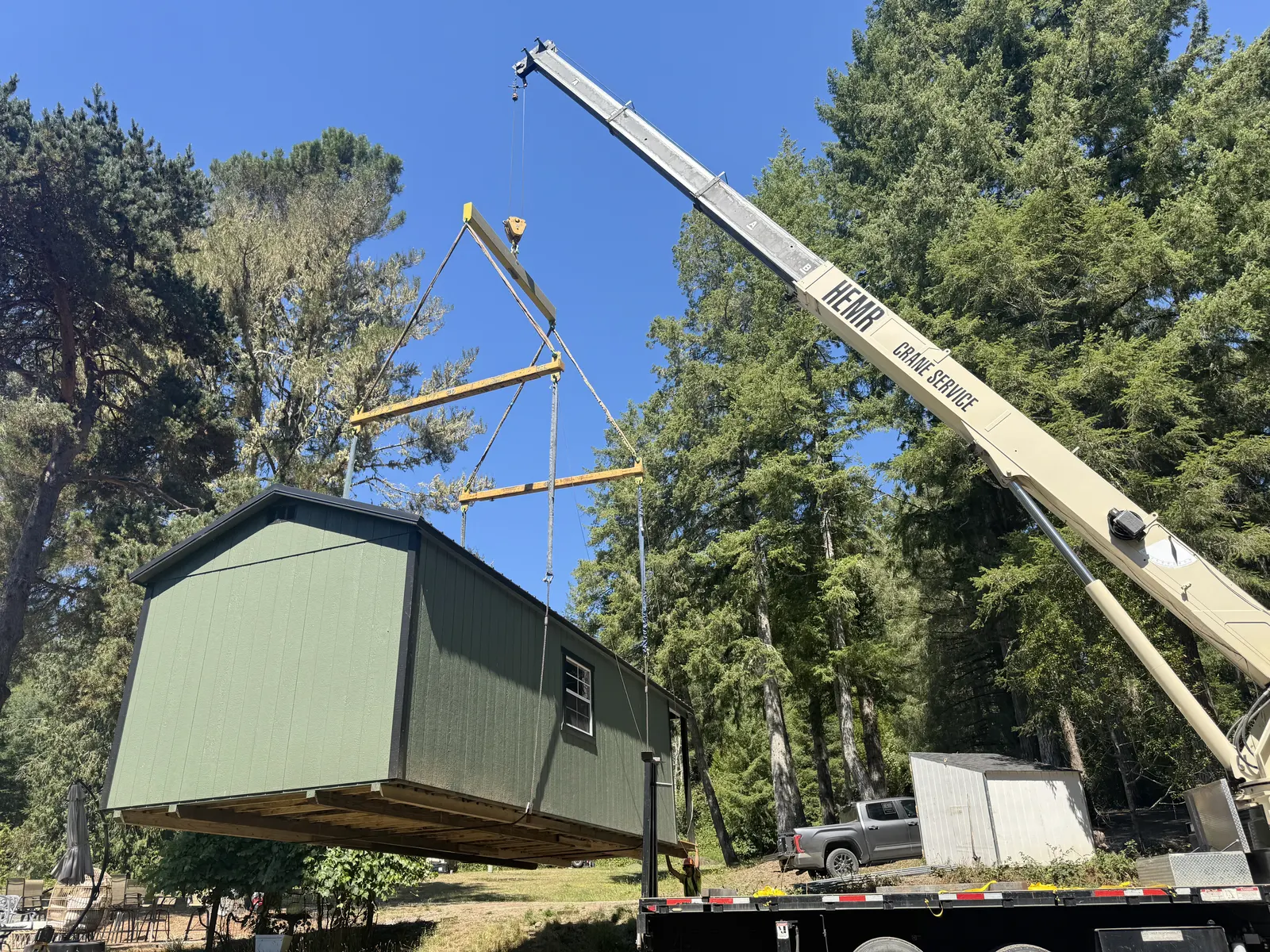 Setting a finished building into place