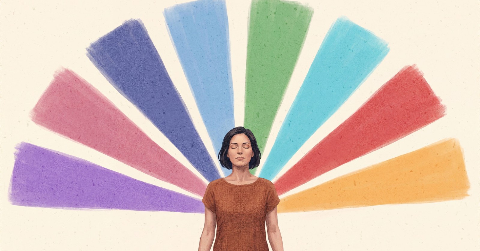 A woman with short dark hair in a rust top stands with her eyes closed in front of a fan of eight colored rays, violet through amber, on a plain cream background.