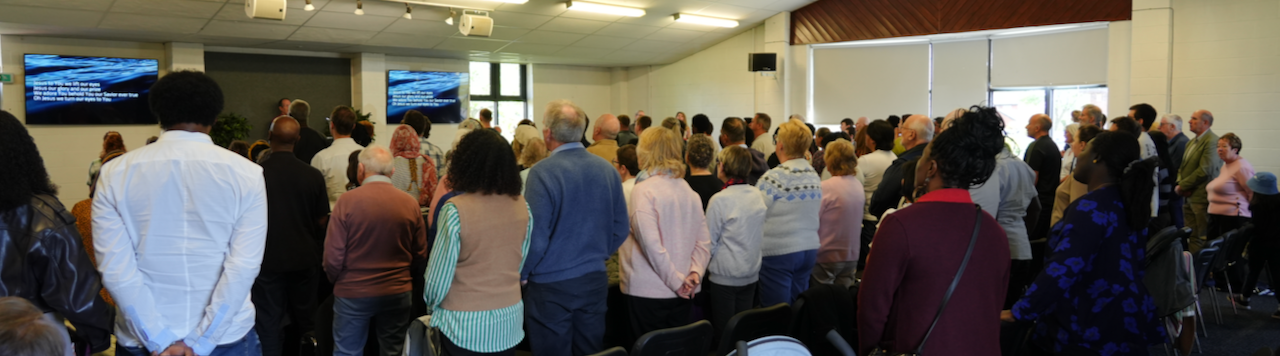 Church congregation standing and singing together