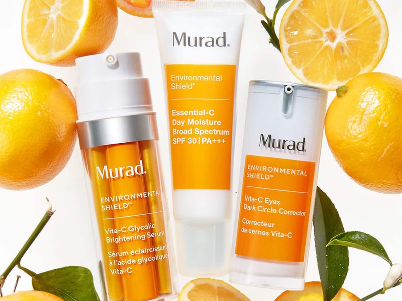 Various Murad face creams with a backdrop of lemons.