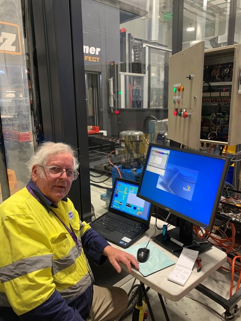 John Donaldson in an industrial workshop environment
