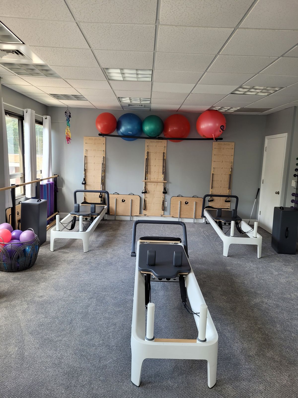 Reformers and Pilates chairs in the studio