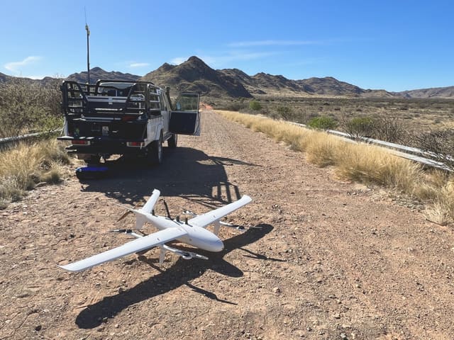 VTOL drone doing a LiDAR aerial survey