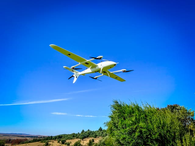 VTOL drone doing a LiDAR aerial survey