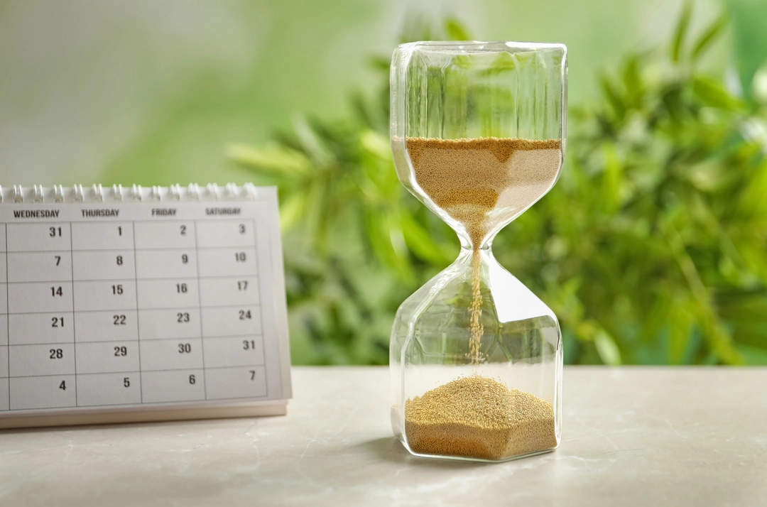 Clock and paperwork representing time-saving process