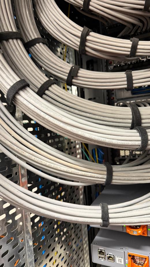 Structured cabling neatly dressed into a rack