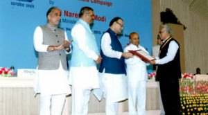 Image of phoenix receiving the national award for smart cane