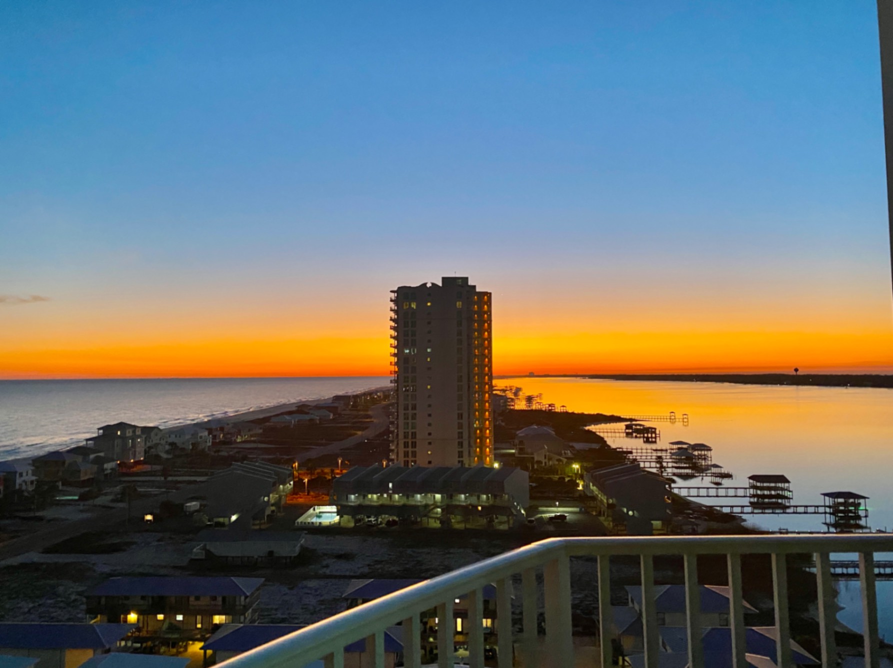Another view of the sunset with the beach on one side and intracoastal on the other.