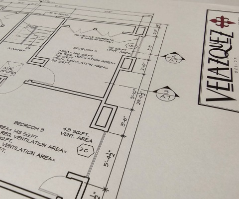 Architectural and structural drawings on a desk