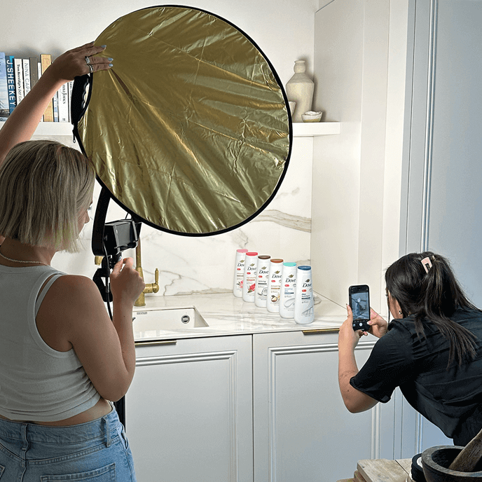 Photots being taken of a line of Dove products