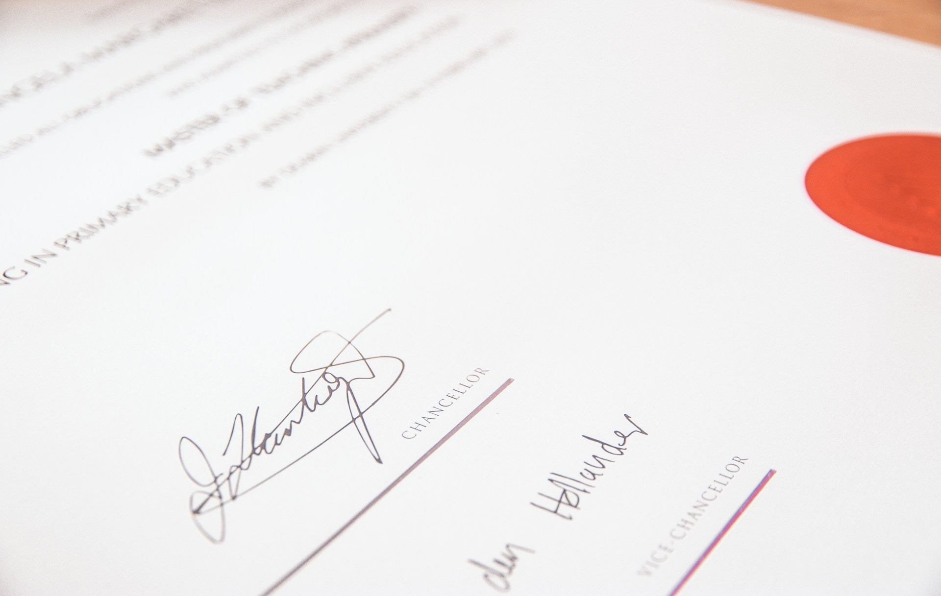 Certificate with official signatures and a red seal