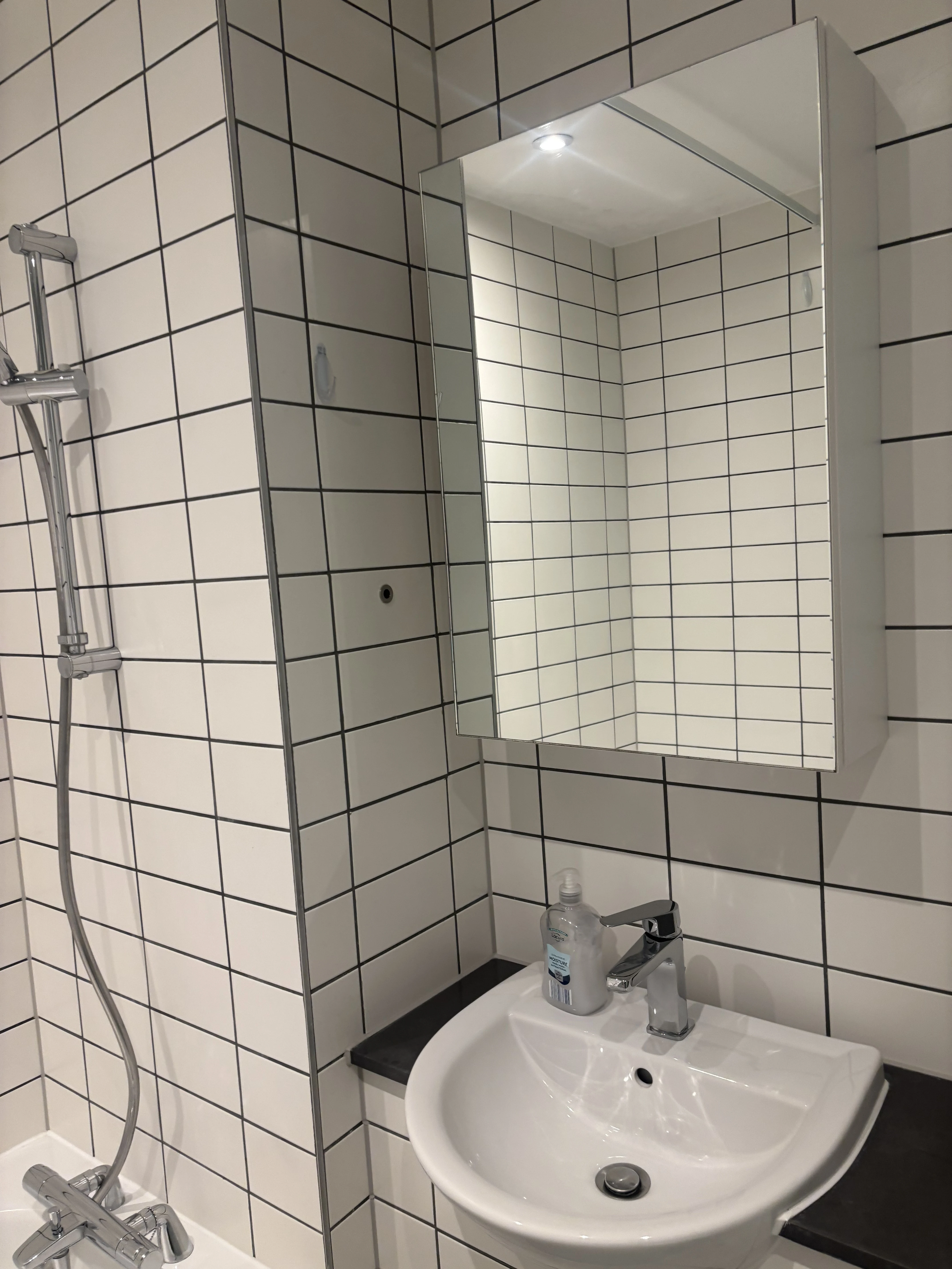Spotless restroom mirror