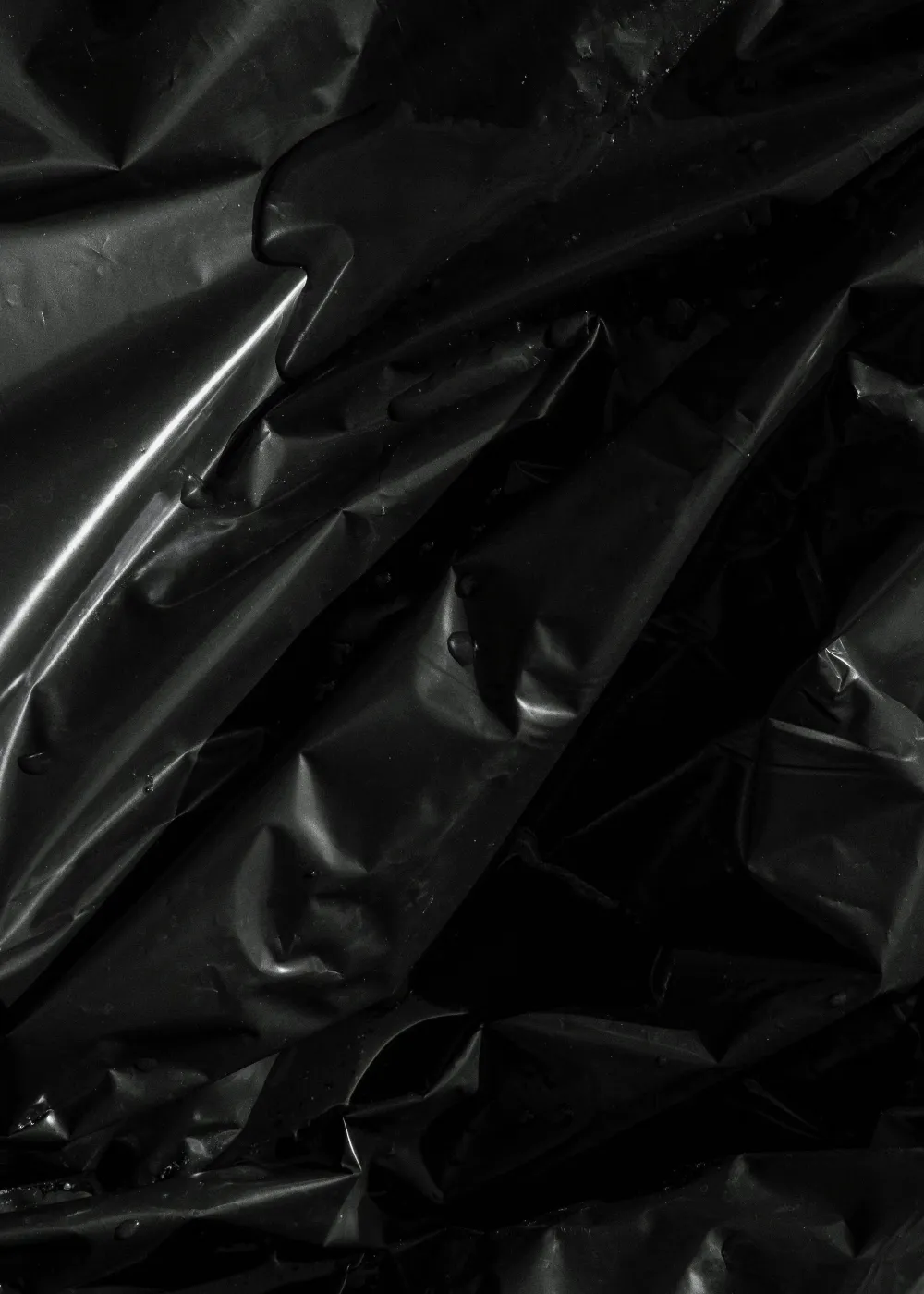 Close-up of Sanipak heavy-duty black polyethylene garbage bag material