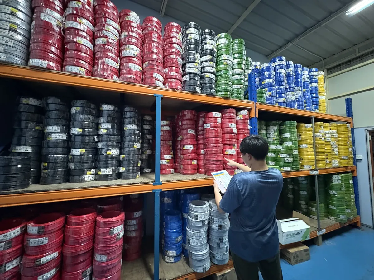 Vertex staff at cable warehouse in Batam