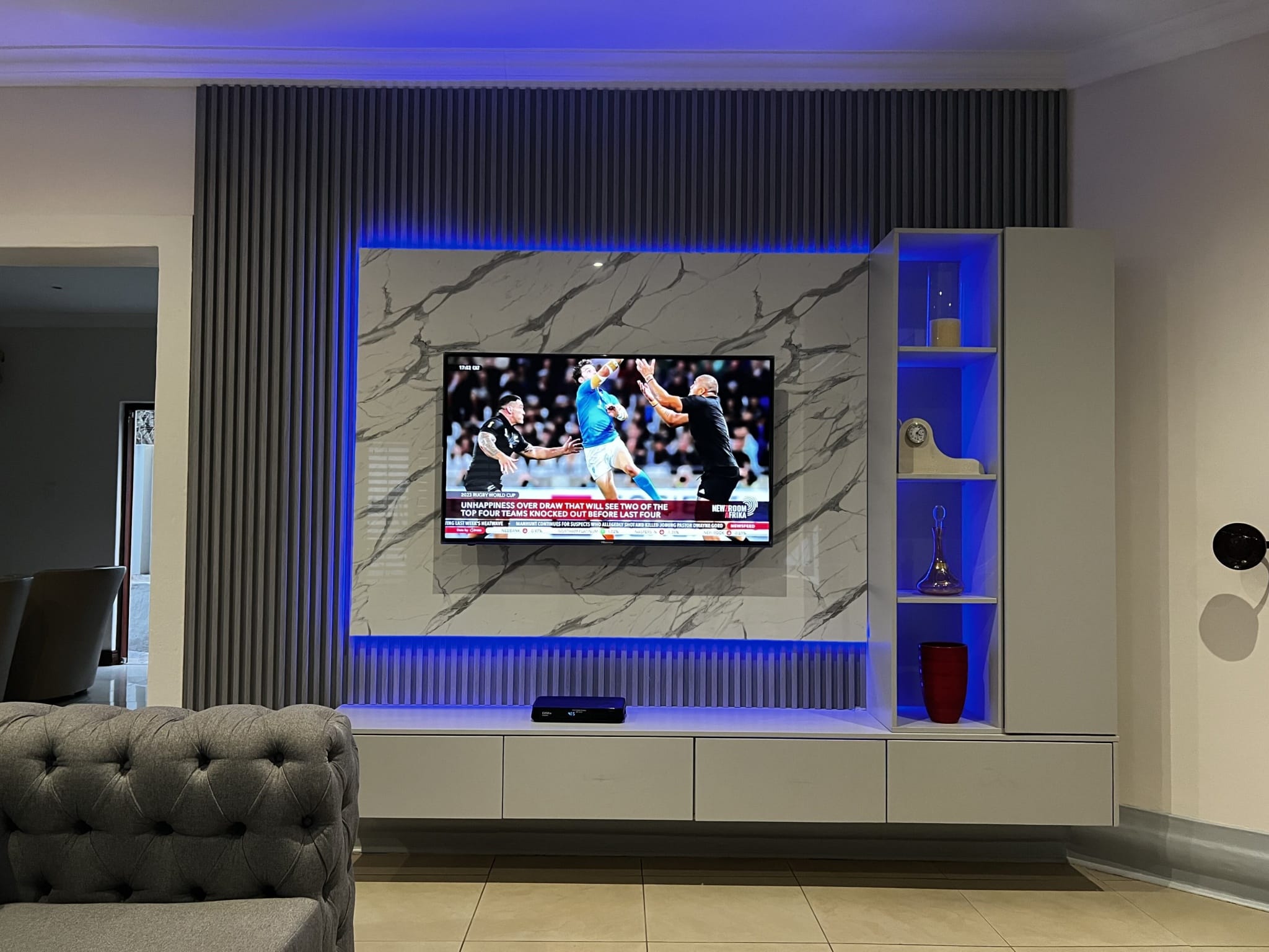 TV media wall, backlit marble panel